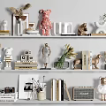 Elegant Decorative Ornament Combination With Statues Books Vase Camera And Figurines On Shelves