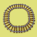 Curved Toy Train Tracks With Small Toy Cars On Yellow Background
