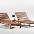 Two Rattan Woven Lounge Chairs With Wooden Frame And Side Table Lamp