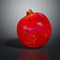 Ripe Juicy Red Pomegranate on Dark Reflective Surface with Glossy Skin