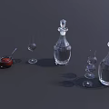 Transparent Kitchen Condiment Bottles With Red Sauce Bowl Spoon And Small Glasses On Dark Background