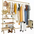Multi Tiered Garment Rack With Dresses Shirts Bags Shoes And Luggage