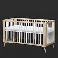Baby Crib With Light Colored Wooden Frame White Rails And White Mattress