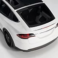 White Tesla Model X Electric SUV With Black Wheels And Modern Exterior Design