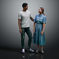 Two People Standing Together Wearing White T-Shirt Green Pants And Blue Dress Smiling