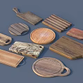 Natural Wood Cutting Boards with Various Shapes and Kitchen Utensils