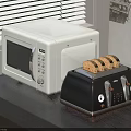 White Microwave And Black Toaster On Kitchen Countertop With Toasted Bread And Window Blinds
