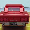 Red Electric Sports Toy Car With Shiny Surface Building Block Style And Driver Figure