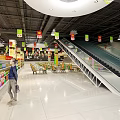 Supermarket Interior With Red White Checkout Counters Hanging Promotion Signs Customers Shopping Shelves And Escalators