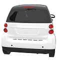 White Compact Car With Black Roof Red Alloy Wheels And Two Door Design