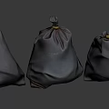 Three Gray Plastic Bags With Tied Tops For Home Waste Storage