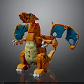 Orange Dragon Toy Figure With Blue Wings Yellow Belly And White Claws