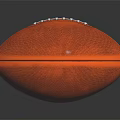 Orange Textured Stitched Football Sports Equipment on Black Background with Reflection