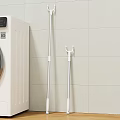 Clean White Washing Machine In Laundry Space With Mop And Hanger On Tile Wall