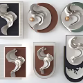Modern Wall Decor With Abstract Curved Metal Designs And Contrasting Colors