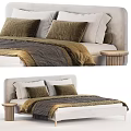 Elegant Modern Double Bed With Beige Headboard Brown Velvet Pillows And Gray Blanket