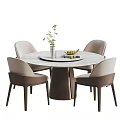 Modern Marble Dining Table And Beige Chairs With Potted Plant Fresh Fruits And Books