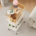 Warm Living Room With White Rolling Cart Tablet Desserts Pink Lamp Books And Green Plant