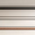 Three Long Pendant Lights in Black Silver and Brown Installed on White Wall Interior Design
