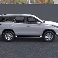 White Toyota SUV Featuring Modern Front Grille And Sleek Body Design