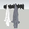 Wall Mounted Hooks Hanging White and Gray Clothes on Gray Wall