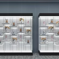 Toy Collectibles Store Featuring Two Glass Display Cases With Multiple Shelves And Diverse Figures