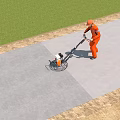 Industrial Park Maintenance Worker Pushing Equipment On Gray Pavement Beside Green Grass And Dirt Slope