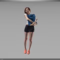 Woman Smiling While Holding Blue Items Wearing Black Shorts And Pink Sneakers On Gray Background