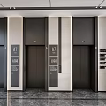 Modern Hotel Elevator Lobby With Dark Elevator Doors Marble Flooring And Decorative Panels