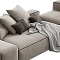 Comfortable Neutral Toned Sectional Sofa With Linen Fabric Decorative Pillows And Knitted Throw Blanket