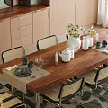 Cozy Restaurant Interior With Wooden Dining Table Rattan Chairs And Circular Wall Decor