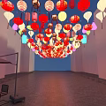 Numerous Colorful Lanterns Hanging in Hall with Brick Floor Blue Ceiling and Pink Walls