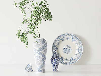 Blue And White Floral Pattern Ceramic Vase Plate Jar With Green Plant On White Tabletop 3d model