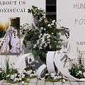 Check-in Area Setup For HUNLISHEJI AND FOXICAL Save The Date With Photo Display And Flowers