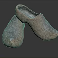 Traditional Handcrafted Wooden Clogs With Intricate Carved Patterns And Classic Design