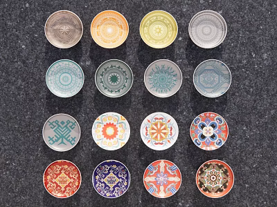 Multiple Circular Decorative Pendants with Various Colors and Different Patterns on Dark Background 3d model