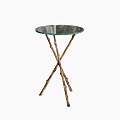 Modern Coffee Table With Round Glass Top And Crossed Branch Like Legs