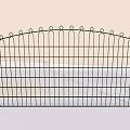 Green Wrought Iron Fence With Curved Top Decorative Pointed Patterns And Base Supports