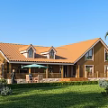 Detached Villa Featuring Orange Roof Wooden Structure Green Lawn Palm Trees and Patio with Umbrella