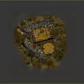 Yellow Radioactive Danger Barrel With Warning Signs On Deserted Ground With Weeds And Stones