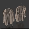 Two Beige Coats Hanging on Hangers Showing Front and Back Views on Dark Blue Background