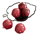 Fresh Ripe Pomegranates Placed In Black Fruit Holder With Extra Fruits