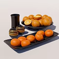 Fresh Oranges And Lemon Slices With Black And Yellow Striped Containers On Black Plates