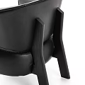 Black Leather Single Sofa With Modern Wooden Armrest And Comfortable Seating Design