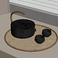 Minimalist Black Tea Set with Bamboo Handle Woven Tray and Small Teacups on White Windowsill