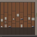 Brown Decorative Wall With Bookshelf Books Ornaments And Green Plant