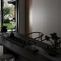 Elegant Ceramic Tea Set Arranged on Wooden Table with Garden View and Chairs
