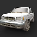 White Pickup Truck With Weathered Front Bumper And Worn Tires On Black Background
