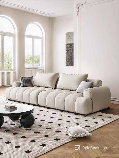 Beige Three-Seater Sofa With Plush Rounded Cushions White Walls Windows And Round Coffee Table 3d model 