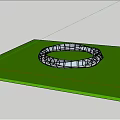 Outdoor Circular Metal Structure On Green Lawn With White Buildings Background